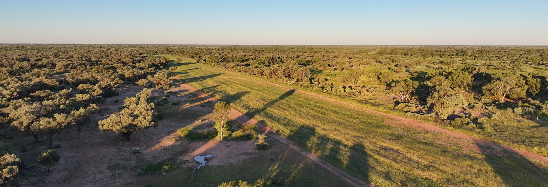 Aerial view of a Queensland rural property at sunrise